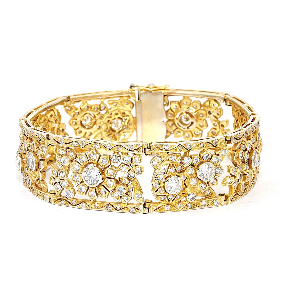 Armband in 585er Gelbgold mit insgesamt ca. 6,2 ct Brillanten und Diamanten, liegend frontal