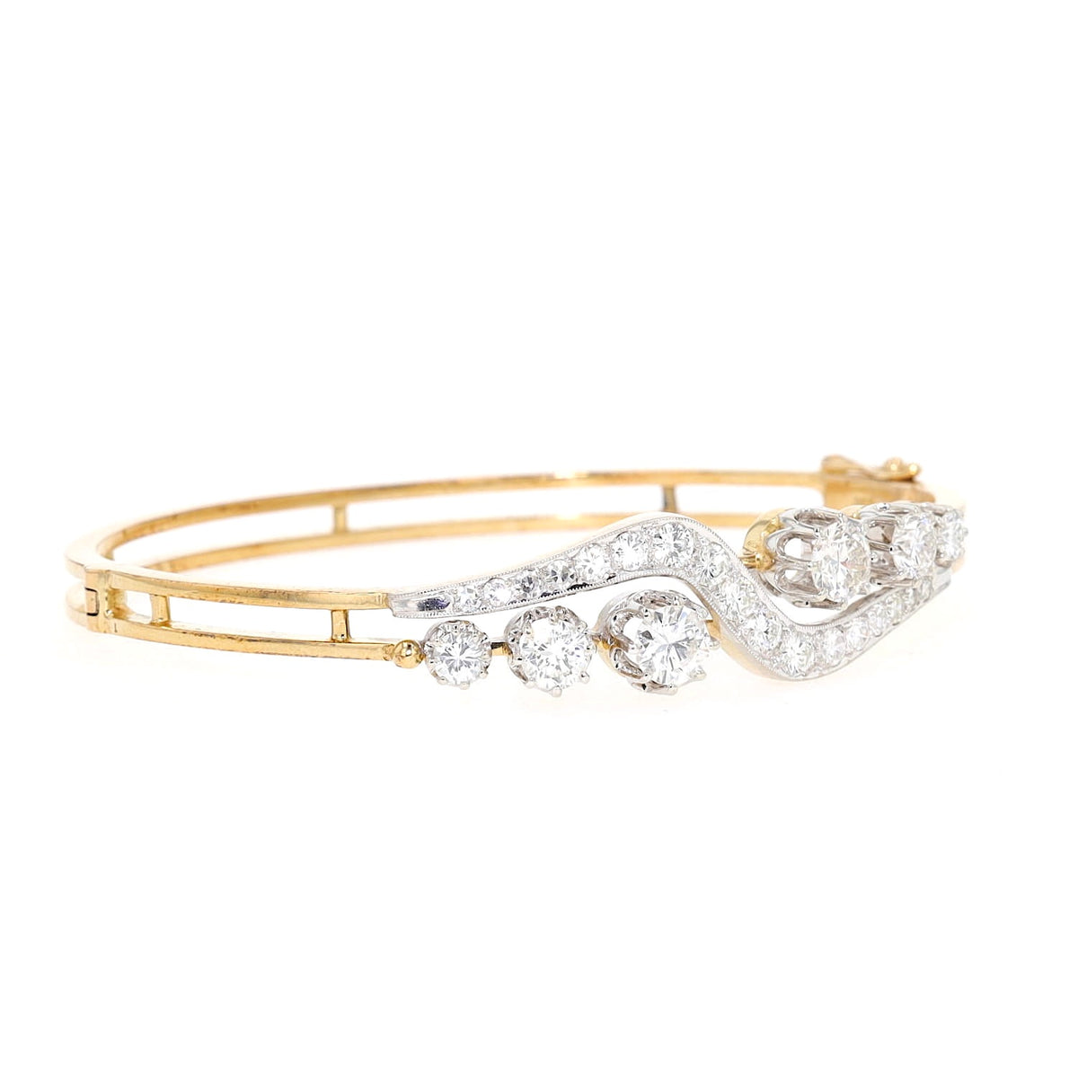Vintage Armreif in 585er Gold mit insgesamt ca. 2,9 ct Brillanten und Diamanten, liegend rechts gedreht