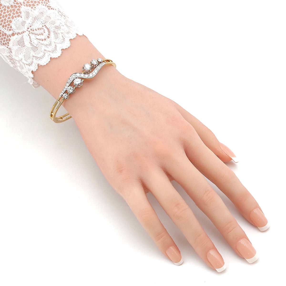 Vintage Armreif in 585er Gold mit insgesamt ca. 2,9 ct Brillanten und Diamanten, stehend