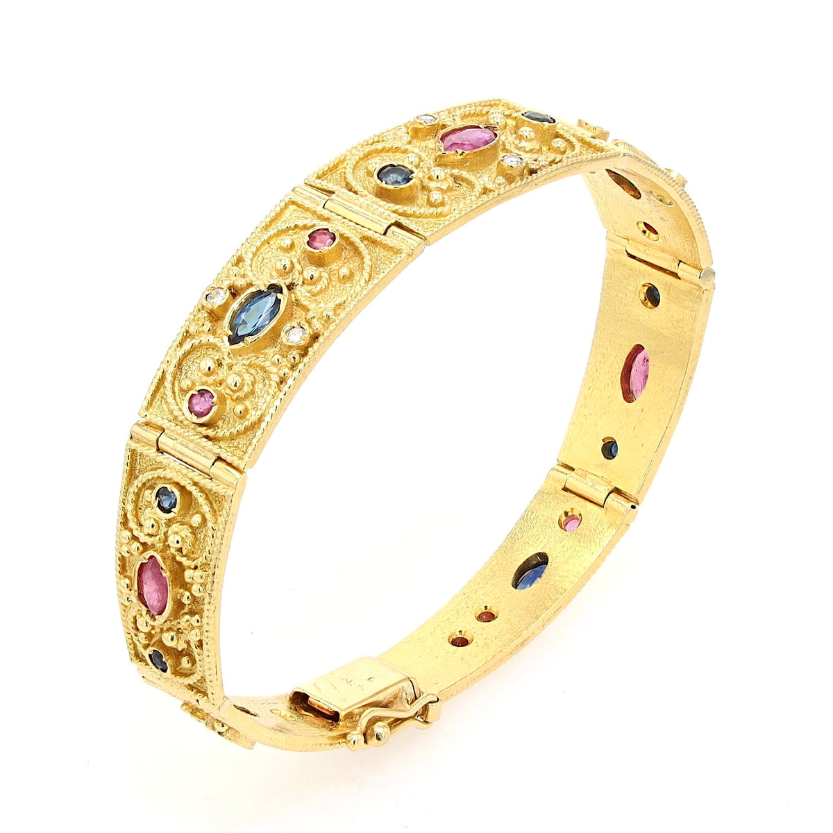 Armband in 750er Gelbgold mit Brillanten, Rubinen und blauen Saphiren, stehend geschlossen