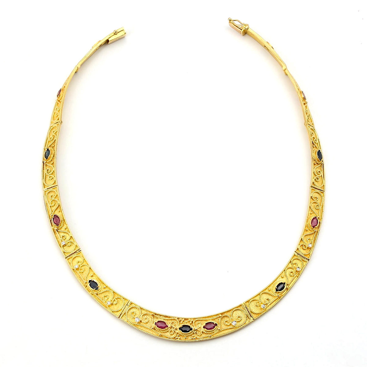Schweres luxuriöses Collier in 750er Gelbgold mit blauen Saphiren, Rubinen und Brillanten, liegend leicht geöffnet