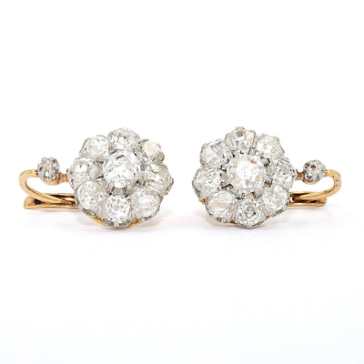 1 Paar Ohrringe, Frankreich um 1910 in 750er Gelbgold, Platin mit Diamanten, liegend frontal