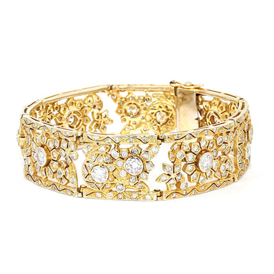Armband in 585er Gelbgold mit insgesamt ca. 6,2 ct  Brillanten und Diamanten, liegend links gedreht