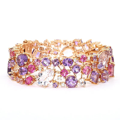 Armband von Buchwald in 750er Rotgold mit Amethysten, Turmalinen, Saphiren, Rubelliten, Morganiten und Brillanten, liegend rechts gedreht