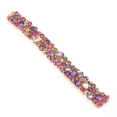 Armband von Buchwald in 750er Rotgold mit Amethysten, Turmalinen, Saphiren, Rubelliten, Morganiten und Brillanten, liegend Draufsicht