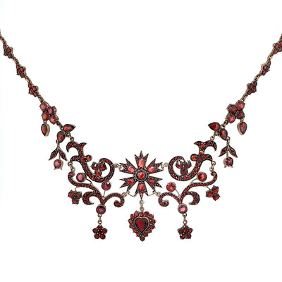Granatcollier um 1900 aus Tombak, vergoldet, hängend frontal