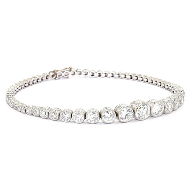 Art Deco Tennisarmband in Platin mit insgesamt ca. 5,1 ct Diamanten im Altschliff, liegend rechts gedreht