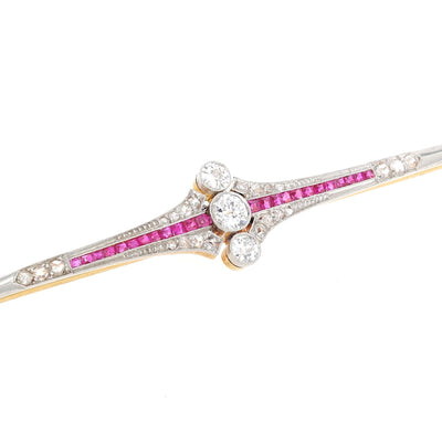 Art Deco Stabnadel aus 750er Gelbgold, platiniert mit Diamanten und Saphiren, liegend rechts gedreht