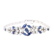 Exklusives Vintage Armband um 1970 in 750er Weißgold mit blauen Saphiren und ca. 2,0 ct Brillanten, liegend geschlossen frontal