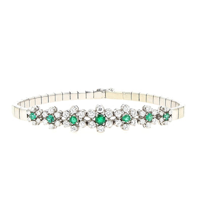 Armband in 750er Weißgold mit Diamanten, Brillanten und Smaragden, liegend geschlossen frontal von vorne