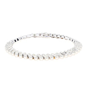 Tennisarmband in 585er Weißgold mit ca. 2,5 ct Brillanten, liegend geschlossen frontal leichte Draufsicht