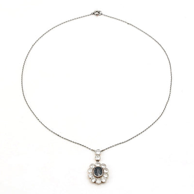 Art Déco Kette aus Platin und 585er Gelbgold mit einem blauen Saphir ca. 1,4 ct und Diamanten mit ca. 2,0 ct, liegend geschlossen