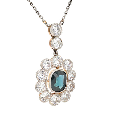 Art Déco Kette aus Platin und 585er Gelbgold mit einem blauen Saphir ca. 1,4 ct und Diamanten mit ca. 2,0 ct, hängend rechts gedreht