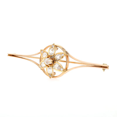 Belle Époque Brosche in 585er Rotgold mit insgesamt ca. 1,77 ct Diamanten, liegend links gedreht