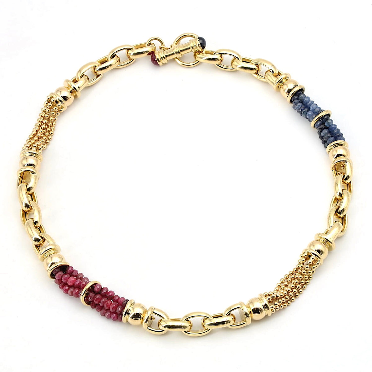 Exclusive italienische  Kette in 750er Gelbgold mit Rubinen und blauen Saphiren, liegend geschlossen