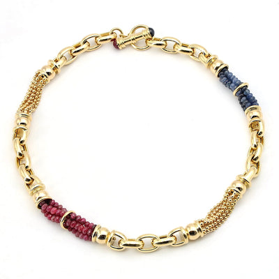 Exclusive italienische  Kette in 750er Gelbgold mit Rubinen und blauen Saphiren, liegend geschlossen