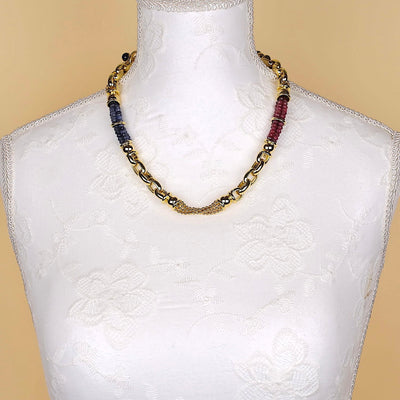 Exclusive italienische  Kette in 750er Gelbgold mit Rubinen und blauen Saphiren, an einer weißen großen Büste